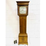Oak longcase clock.