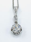 White gold and diamond pendant and chain