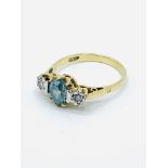Rare blue zircon and diamond ring set in 18ct gold