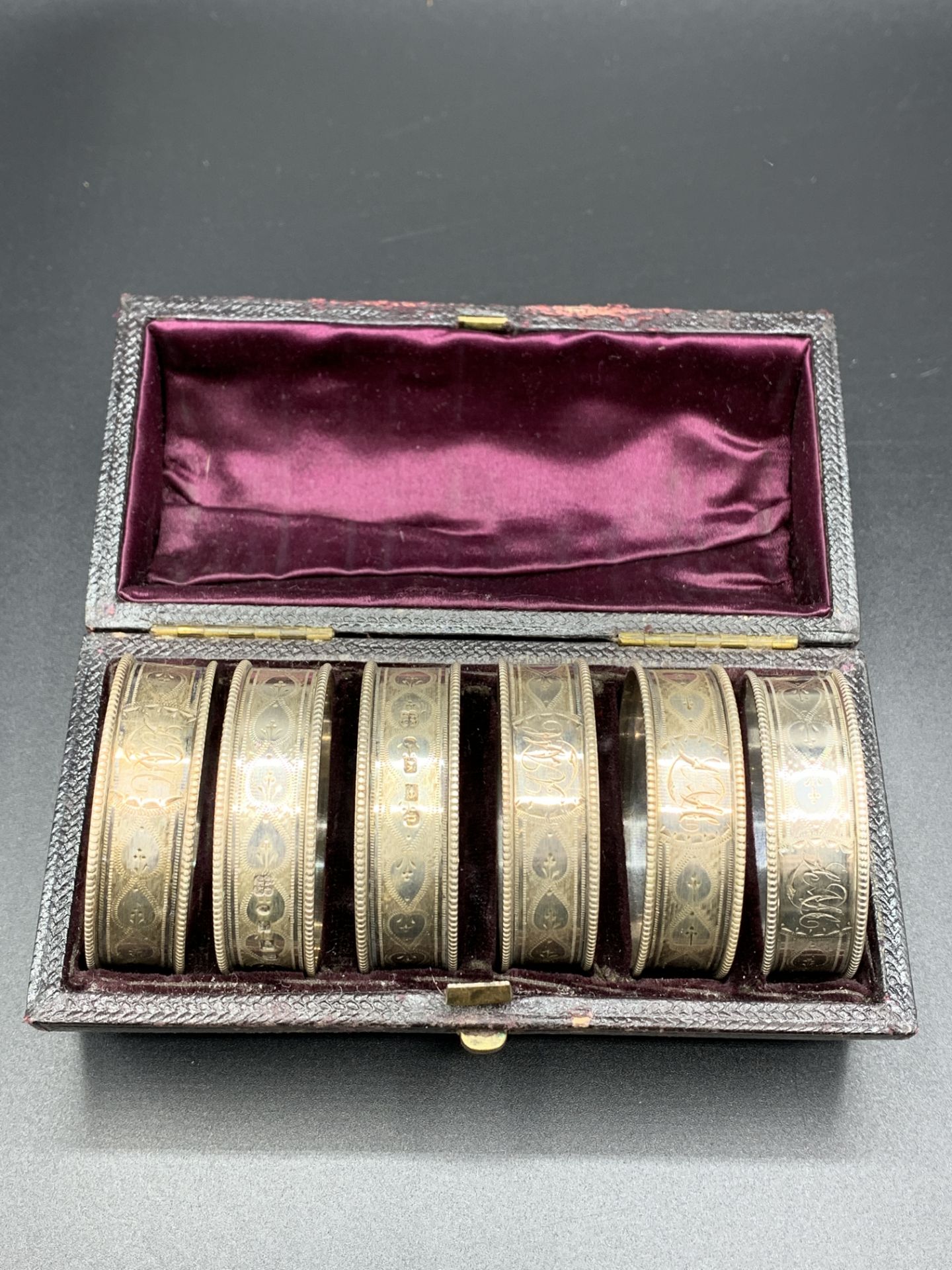 Six Victorian finely decorated napkin rings