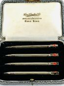 Set of 4 sterling silver Bridge pencils in original Lane, Crawford Ltd of Hong Kong case