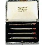 Set of 4 sterling silver Bridge pencils in original Lane, Crawford Ltd of Hong Kong case