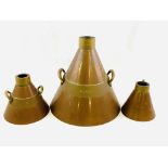 Three copper and brass conical shaped measures: 10 litres, 2 litres, and 1 litre