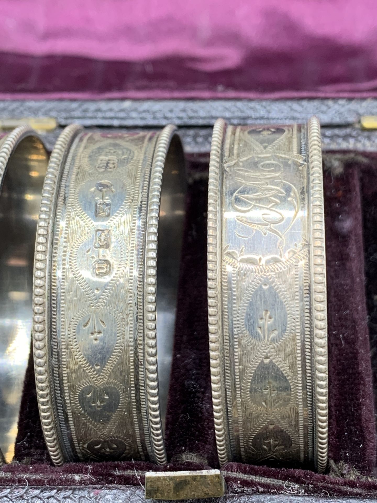 Six Victorian finely decorated napkin rings - Image 3 of 4