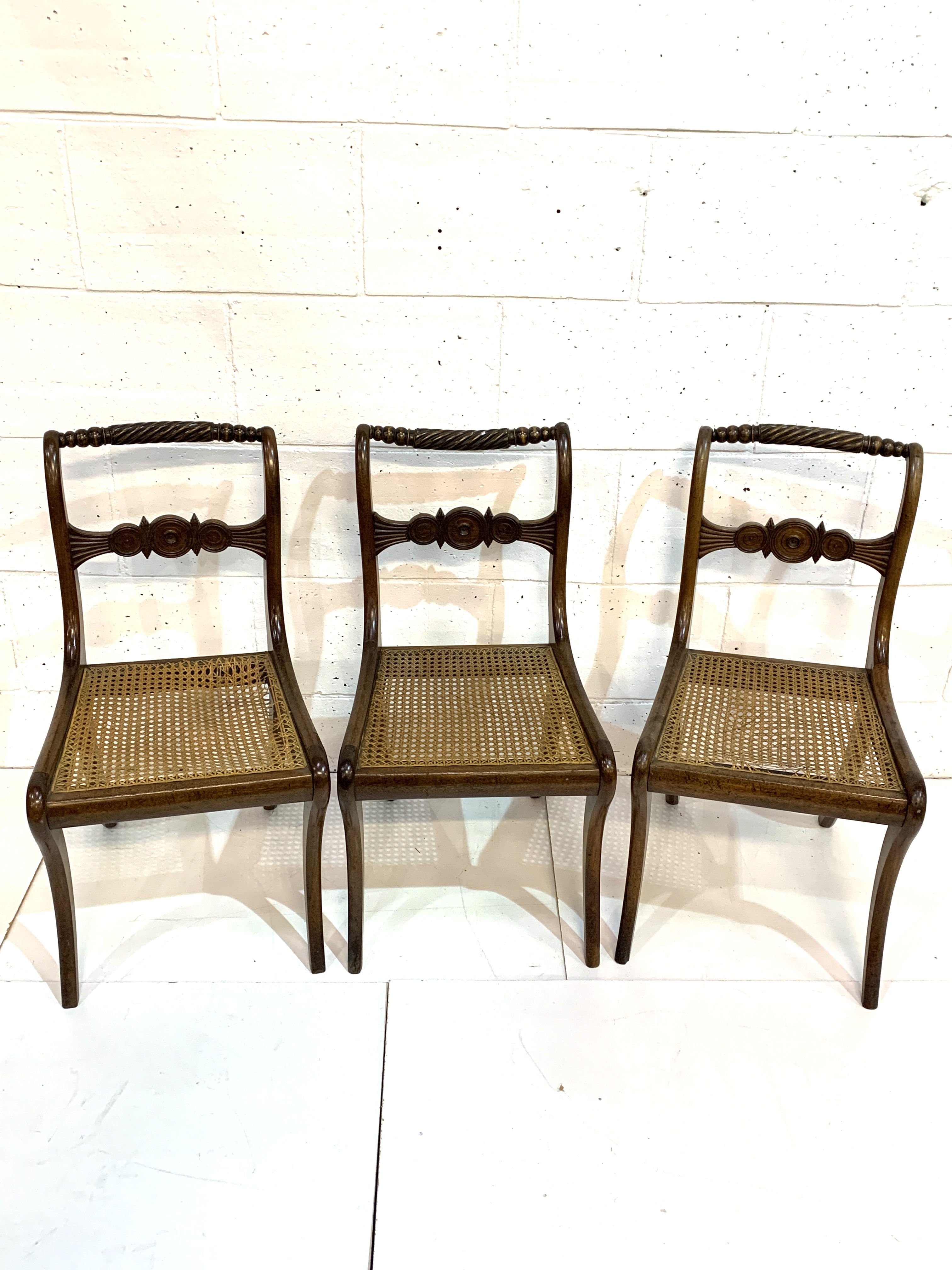 Three Regency sabre-legged 'Nelson' back cane seat dining chairs. - Image 2 of 4