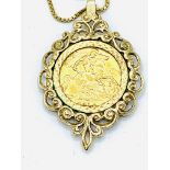 Half sovereign, dated 1914, set in 9ct gold decorative pendant, on 18ct gold chain