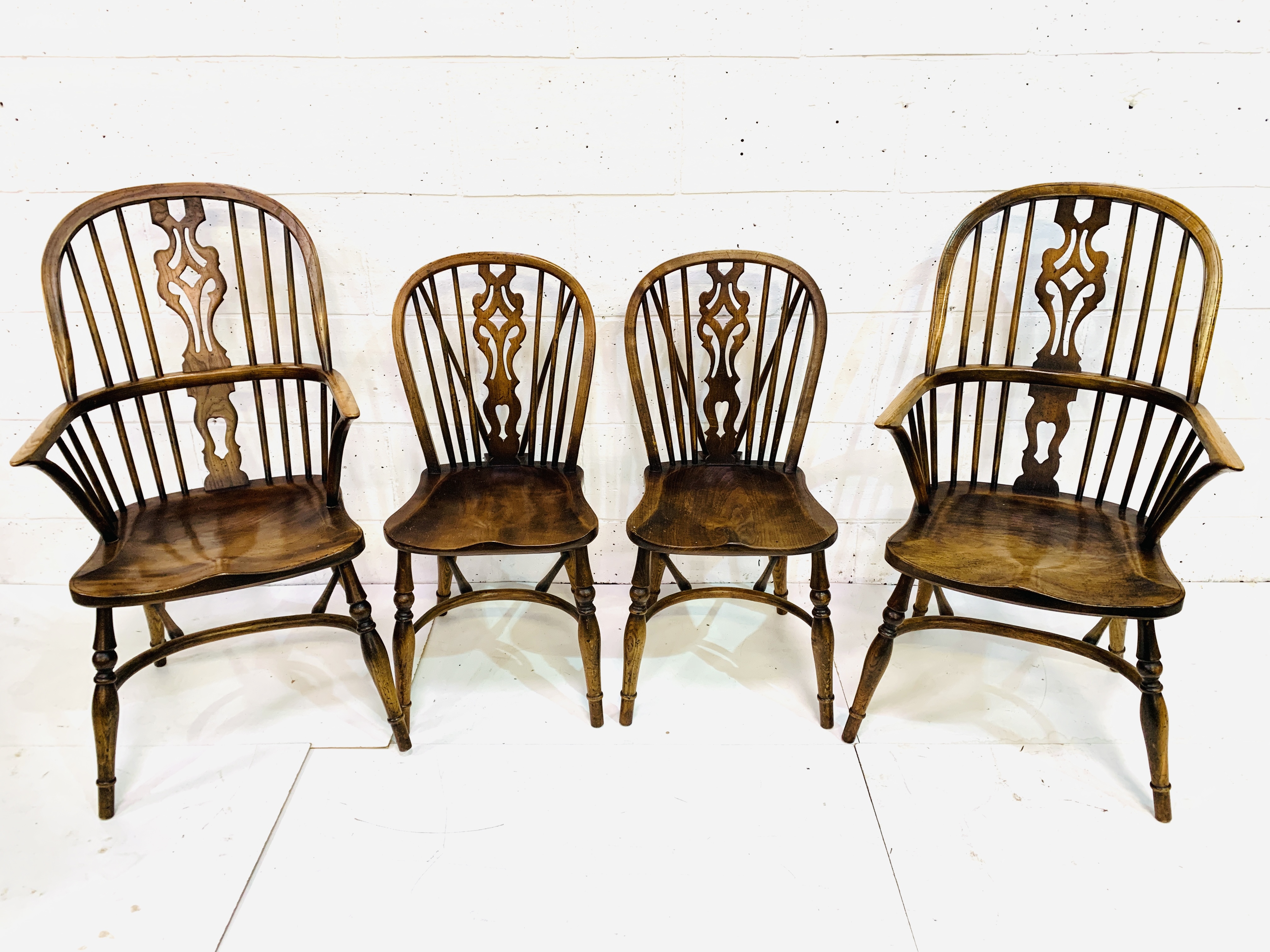 A group of 4 oak and elm chairs