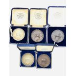 Two hallmarked silver medals and three bronze medals, inscribed Royal Counties Agricultural Society
