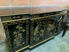 Black lacquered Oriental break-front cabinet