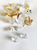 A collection of Swarovski and crystal glass objects.