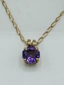 9ct gold and amethyst pendant on a 9ct gold chain