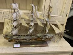 Two wooden model sailing ships