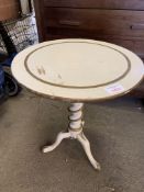 Cream and gold painted circular top wine table on spiral pedestal to three pad feet