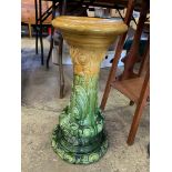 Ceramic plant pot stand, and a mahogany plant pot stand,