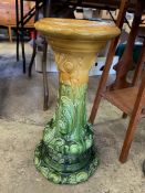 Ceramic plant pot stand, and a mahogany plant pot stand,