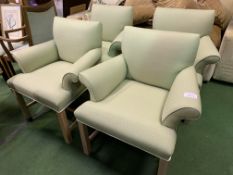 Four pistachio upholstered armchairs