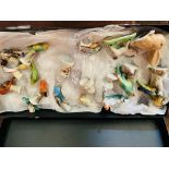 Collection of approximately twenty small ceramic bird figurines