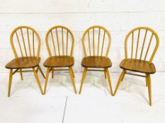 Four Ercol Windsor-style chairs