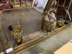 Two brass coal scuttles; brass fender; brass companion set and brass frame spark guard.