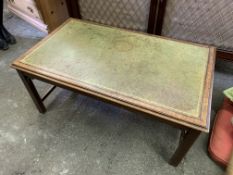 Mahogany coffee table with a green skiver