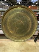 Large brass tray decorated with floral and geometric designs