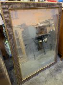 Large bevelled edge mirror with decorative frame