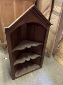 Mahogany wall mounted corner shelf unit with two shape fronted shelves, and arched pediment,