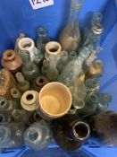 Quantity of glass bottles together with a quantity of stoneware jars