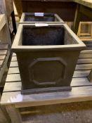 Two black ceramic planters