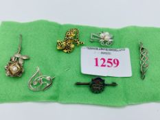 Six silver hallmarked brooches