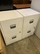 Two white metal filing cabinets