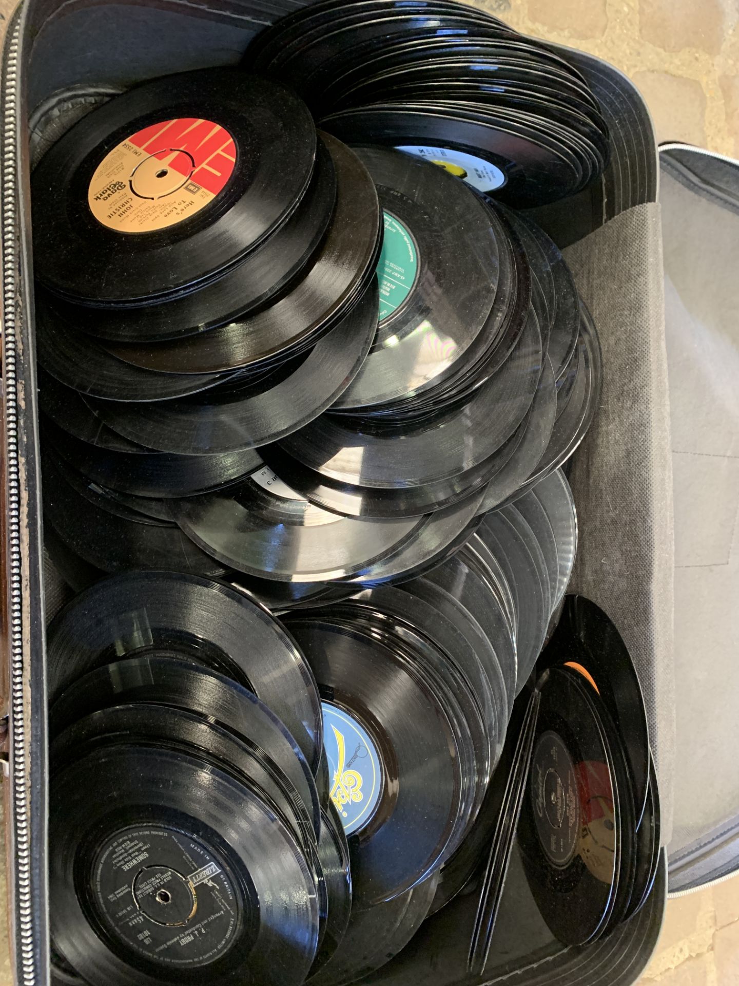 Suitcase containing approximately 300 7 inch singles