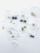 Fifteen pairs of earrings, some hallmarked silver