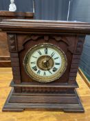 Oak cased mantel clock by Ansonia Clock Company of New York.