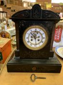 Black slate mantel clock.