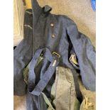Trunk containing a grey Air Force coat and other military items