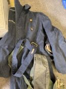 Trunk containing a grey Air Force coat and other military items