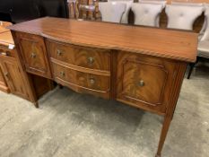 Bow fronted mahogany sideboard.