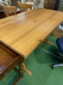 Pine refectory style kitchen table together with two pine rail back chairs.