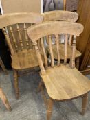 Three Windsor-style chairs