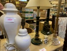 Two white ceramic table lamps