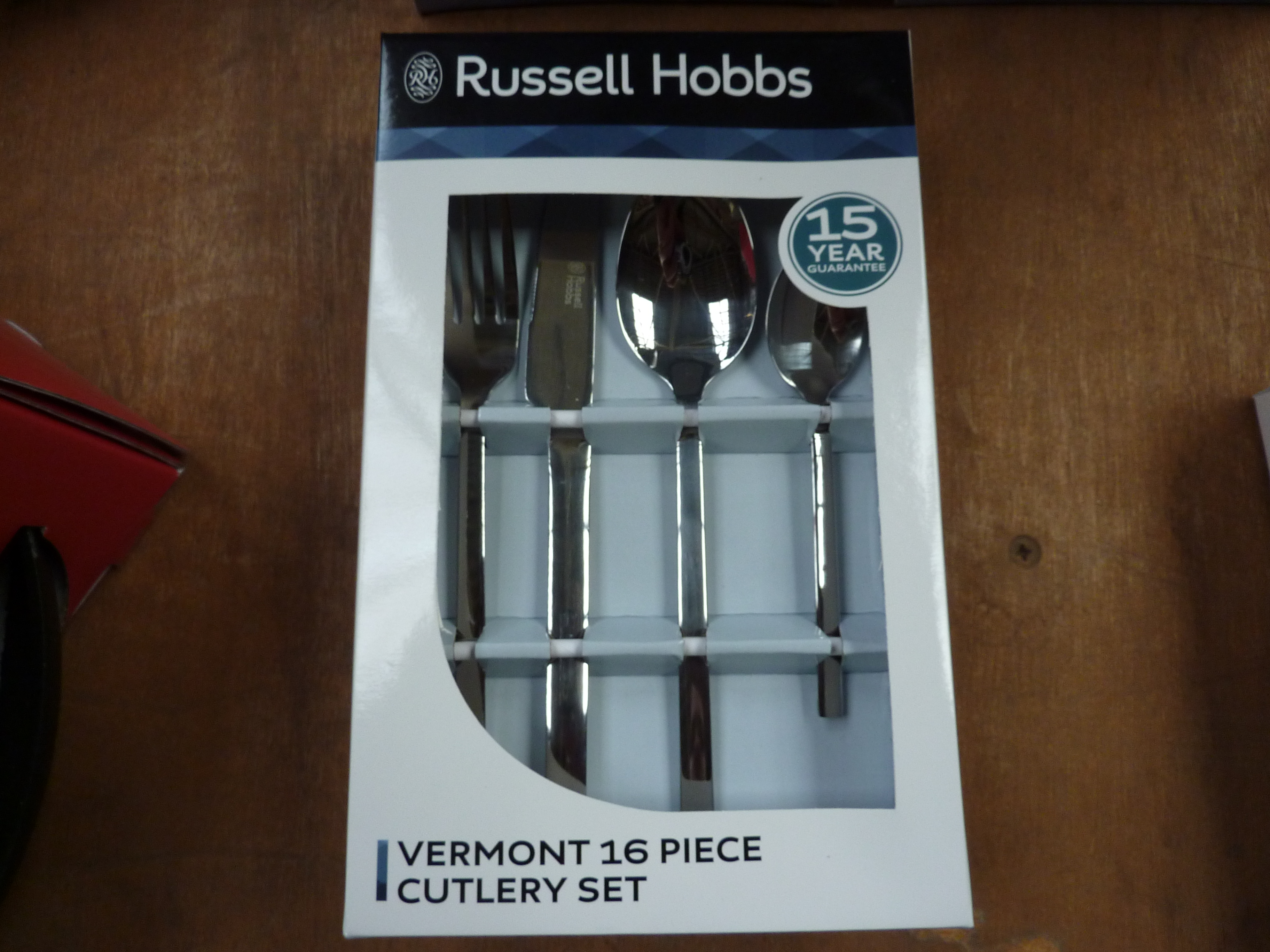 Sixteen piece Russell Hobbs Vermont cutlery set.