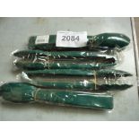 Four plastic tongs