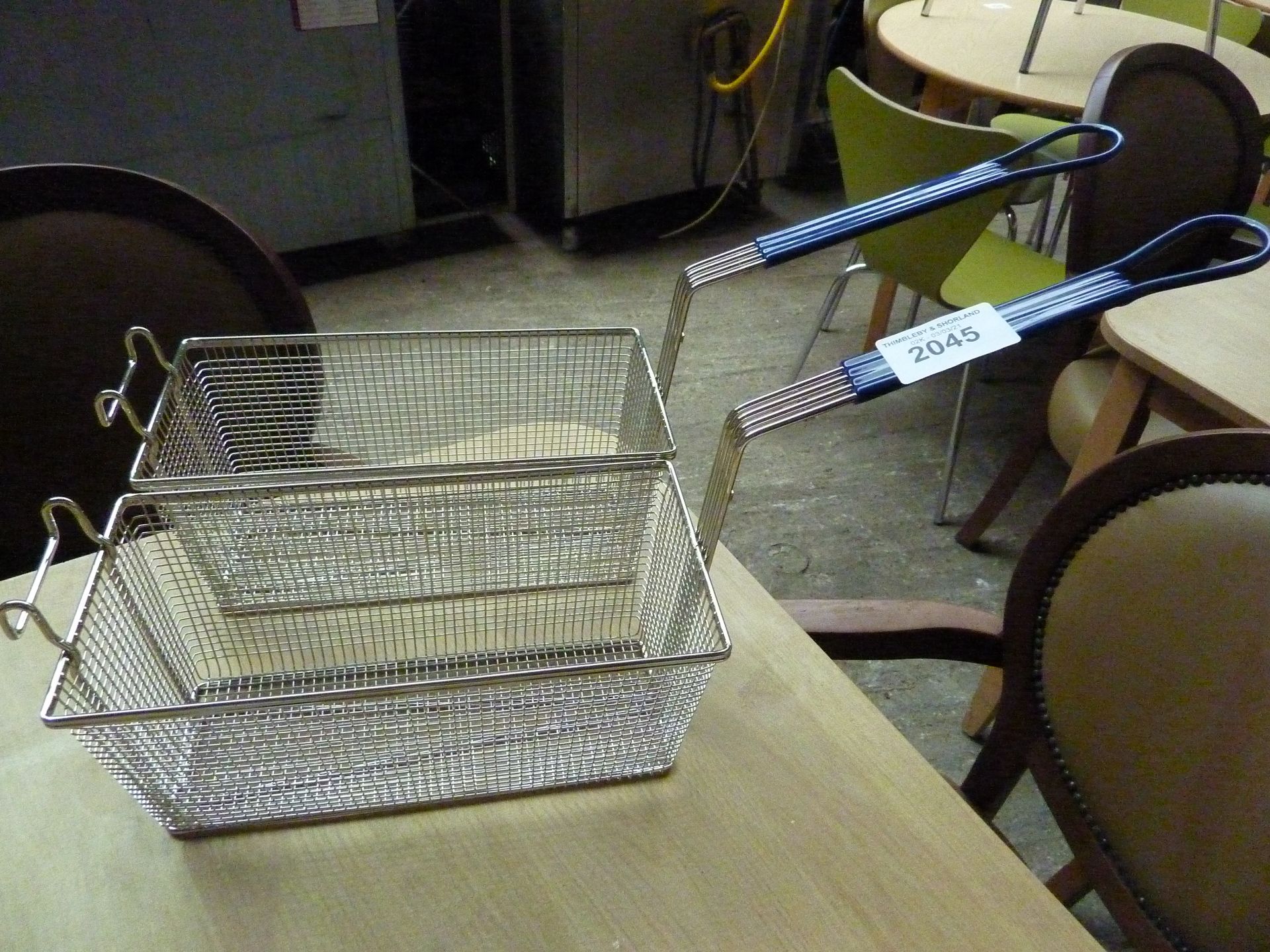 Two fryer baskets