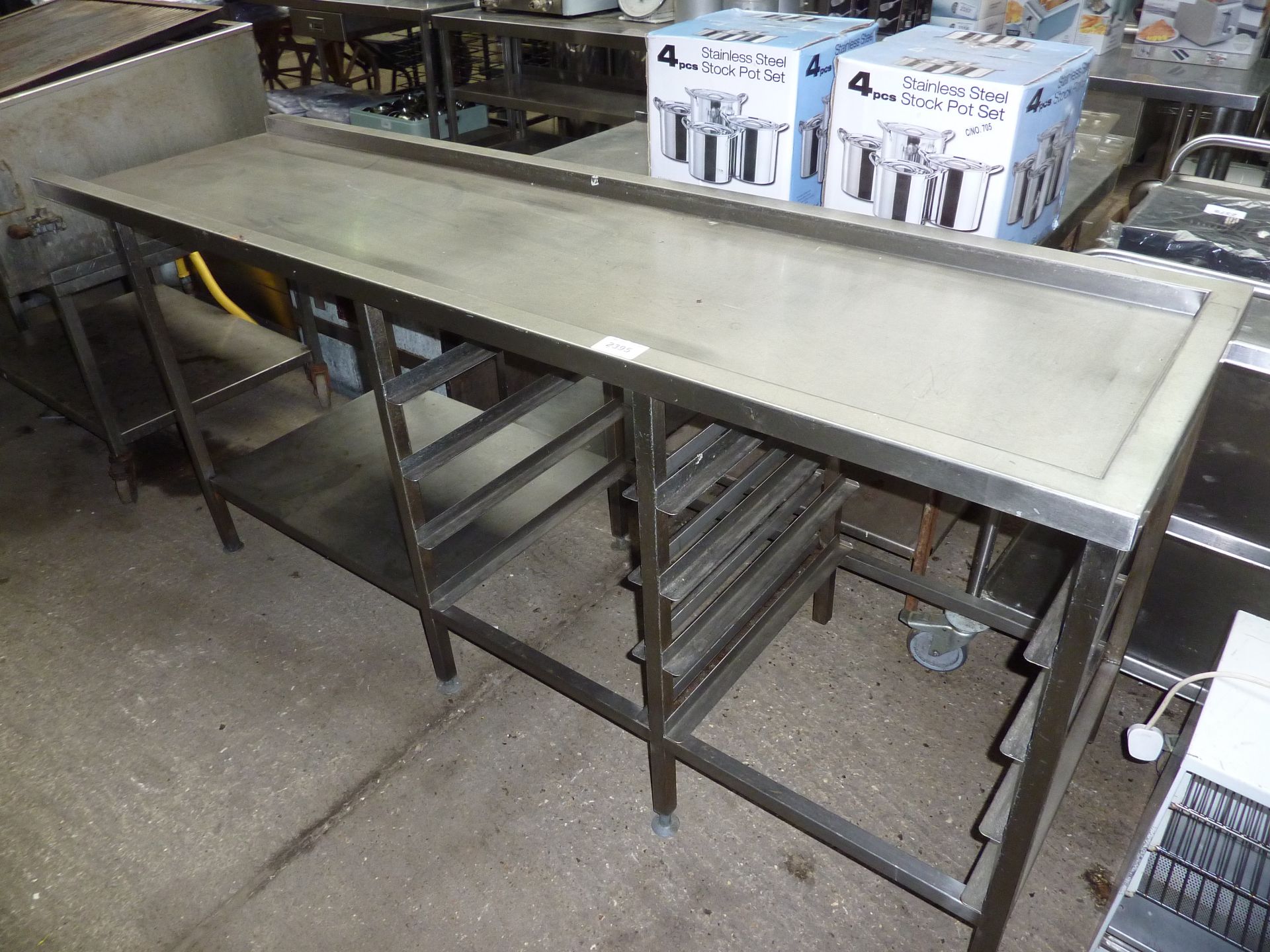 Stainless steel pass through dishwasher table with tray racks