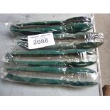 Four plastic tongs