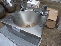 Hand washing sink with taps