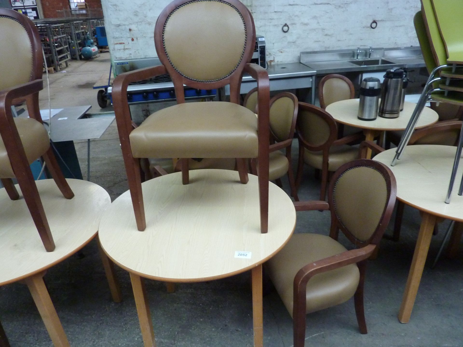 Wooden table with two upholstered chairs