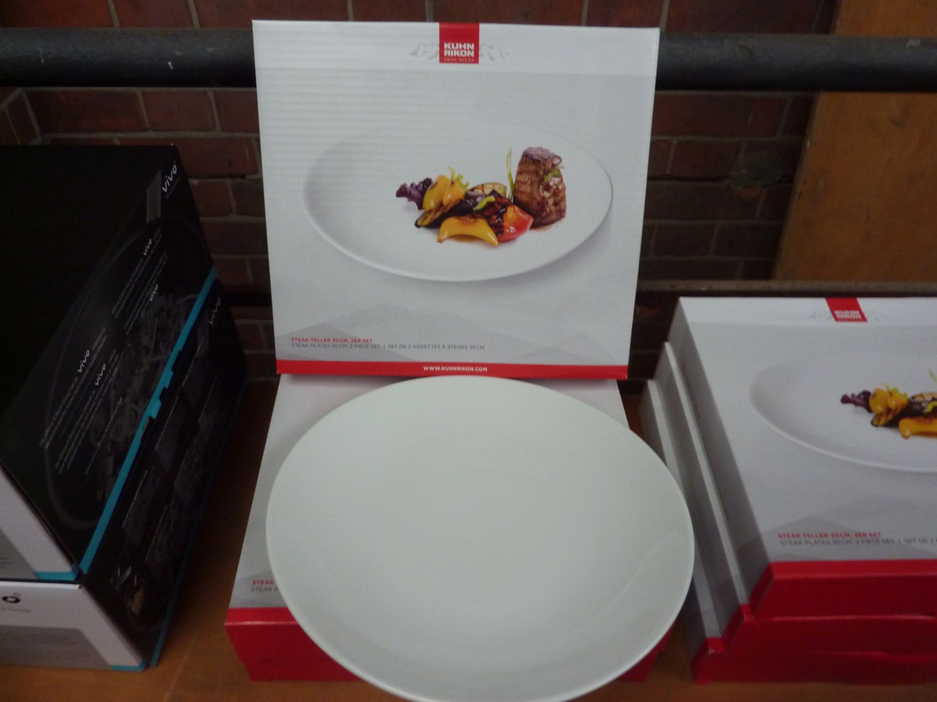 Three boxes of Ruhn Rikon two piece set 30cms steak plates.