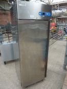 Caravelle stainless steel finish single door upright freezer.